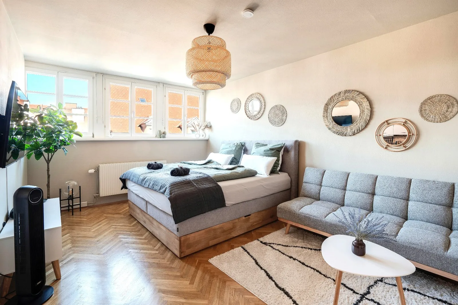 Boho bedroom with a herringbone parquet floor